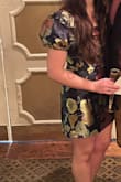 The fit of this dress is super flattering. It has absolutely no stretch so if you're uncomfortable with tight things definitely size up. But, it is sooo cute and I got so many compliments. It was mainly tight in my opinion around my hips/booty. - Kendall F.