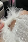 I LOVED this dress so much for my bachelorette but it kinda fell apart an hour into wearing it for the first time.:( I was so sad, but it still looked good and was flattering on my body- just wouldn't wear it again since it tore on the side. - Lanie J.