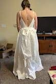 This dress would require SO much steaming to get all of the wrinkles out. It also wasn't my style. The bow looked kind of funky in the back. Overall, I just wasn't impressed with this dress compared to some others I tried from Lulus. - Isabel B.