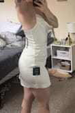 This dress is extremely sexy and fun. For me, I didn't want a tight / too short dress. Since it was more snug on my legs/butt than the model's, it is much shorter looking. I absolutely could've made it work, I just wasn't trying to be pulling it down all night while I was dancing/enjoying myself, so I went with something more whimsical and fun. If you are looking for sexy, this is it! - Katie S.