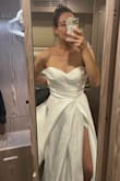 Beautiful beautiful beautiful! I haven't worn the dress yet as my wedding day is only in July but I have tried it on twice and it fits so so well. It's nice and long so if you are taller you will be fine, I might have it shortened if I have time, otherwise, I'm going to rock the length. The material is gorgeous and the quality is absolutely stunning. Very happy with my dress and the price too. It came very quickly as well. The slit does come up quite high but you can very easily pin it or stitch it. - Melissa S.