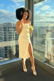 I found this website, and I identify with the model so much! The dress wore me like a glove, and the material has a great quality. The dress is not transparent at all! - Sue S.
