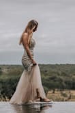 The dress looked great and very close to the photos on the website. As it is very tight, I sometimes had to slightly move it down to fit properly. - Michelle G.