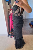 Not gonna lie, I bought this dress on total impulse because it's exactly what I'd wear if I was High Lady of the Night Court. Do I have anywhere yet I actually need this for? No (though we do have military balls periodically so I do actually need gowns for these). But I legit bought this because it's exactly what a favorite literary character would wear. If you've read ACOTAR, then you'll get it. This dress was made for Velaris, but since I'm stuck in the human world, a dress is as close as I'm coming. One of the ribs on the side bends slightly... but it's under the arms so at least it's not too noticeable. It also feels like the minute the beat drops and I need to raise the roof, the sleeves will rip off and become armbands instead, but that's the price one has to pay to put your hands in the air like you just don't care. It fits true to size, and if you've ever felt like a beautiful fae warrior in your soul....buy it!!! - Reese T.