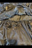 We were so excited when we ordered this dress for my daughter's prom. Initial thoughts were the dress was gorgeous, corset style top was well made. As soon as my daughter tried it on, it was very obvious that a layer in the very front was sewn upside down. All the sequins were hidden and even sewn straight through. Extremely visible and an eye sore. Reached out to customer service and was told it was out of stock so unable to exchange it, but offered a refund if we returned it, or a lousy 40% rebate to keep. 40%???? No thanks. - Heather S.