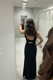 I wore this dress to a ball and it fit great and was extremely flattering! It was comfortable and the fabric was of good quality. It is classy with the high neckline, but then the back adds the perfect amount of spice! I have a smaller waist and a bigger throughout the bottom part of my body, and it fits like a glove. I highly recommend getting this dress for a black tie or a more formal event! - Lucia F.