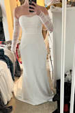 I ordered this dress just to try it on, expecting to return it. Fit like a glove and so elegant. It's as beautiful as the $3000 dress I tried on at the bridal boutique. I will be wearing this iconic dress when I say I do. - Saraleah P.