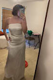 The bow sits beautifully it had no problems. The dress is long so I did have to find heels big enough other than that this dress is dreamy
I love it! - Brianna M.