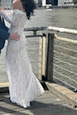 I wore this dress to my elopement ceremony! I wasn't expecting much, as the price is fairly reasonable. But this dress was a dream. It fit beautifully, and the quality was outstanding. I was so happy with this dress and truly felt like a bride! - Sabrina B.