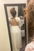I bought this dress in a small I have an athletic build with a big booty and it fits great except it's a bit long. The material feels good not itchy or cheap feeling  I can not wait to wear it on my wedding day! - Allison D.
