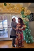 I wasn't sure what size dress I was going to need since I was very pregnant, ended up ordering a large. I was about 160 pounds and 5'0. Also, I was wearing a little heel. - Lucero R.