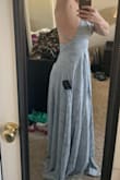 The dress fits well, a little heavy so I could see potentially it cutting into shoulders after a full day of wearing it. It is a very long but overall pretty dress. It washes me out completely. Even though it matched my sister's wedding colors, we are going another route. But overall, I would recommend it! - Brittany S.