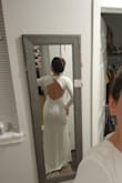 I had been thinking about a dress like this for several months. I finally ordered size M and size S. I could say that I am not in my best shape now, but Medium size was very loose. The small size fits perfectly. I do not need to modify it. I will use it for my intimate ceremony in the mountains early in June. I'm thinking about using sticky bra. The price and quality are unbeatable. - Estefany L.