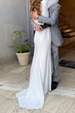 Beautiful dress! I loved it. Got so many compliments. However, I got it tailored as the sleeves were too long, as well as the dress itself (didn't wear high heels). I also added a small hook to pick up the train. So classy, elegant, and simple. Gorgeous dress! - Ruth R.