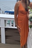 This is by far my favorite dress I've ever bought. It fits perfectly and hides the belly. I bought it in mauve and orange. The orange is a show-stopper during the summer! - Gina P.