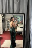 I got this dress a little early for prom, and I am so excited to wear it, it fits so comfortably and perfectly, I got it in a xs and it's a little long but with heels on it'll be the perfect length. The designs of the dress make it stand out so much. It looks even better in person!!! - Joy F.