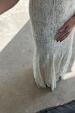 This is a beautiful dress. I tried on others that cost hundreds and even thousands, and I wound up deciding to wear this one for my wedding. The quality is surprisingly good! - Natalie H.