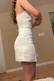 I ordered an XS, because that's what I usually am from Lulu's (even though based on the size chart I should be a S usually). My hips are bigger so based on the flare in the pictures I thought it'd fit okay. An XS was too small for me with a 26.5" waist and 38.5" hips. Fit okay for my chest (34B).  I'd order your actual size on the size chart or even a size up. The top of the dress has a strip of grippy stuff so it doesn't slide down which I like. Great dress if the size is right! The biggest downside was the bottom didn't flare like it does in the pictures. - Hunter H.