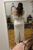 The top feels very good quality, and the blouse is gorgeous. I wish the skirt was made from better material so it doesn't pass through the irregularities of the skin; however, the cut is beautiful - Barbara O.