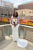 Purchased and wore this dress on my wedding day! Loved the lace, train, and price. Very affordable without breaking the bank. My only alteration was adding a beaded crystal belt that I sewed on myself to make the dress have a little ''bling'' but that was it. :) - Jentle R.