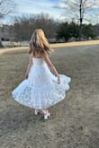 This dress was absolutely perfect for my bridal shower. I got so many compliments on it. It was very comfortable, the straps were adjustable, and the fabric was quality - no wrinkle or anything! - Shannon J.