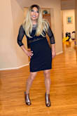 Really big fan of this dress! A unique take on a LBD.  My arms are a little tight, but would highly recommend this dress! - Gregory L.