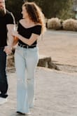 Super cute bodysuit. Doesn't compress anything if that's what you're looking for but it's very comfortable and flattering. - Veronica N.