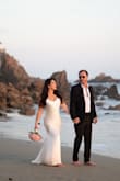 I was inspired by Carolyn Bessette-Kennedy's wedding look. I wanted a timeless and forever look that I could look back on for years to come and still love it. This dress was a dream come true the moment it arrived in the mail. I put it on, and I felt like a million bucks. The material is high quality soft and comfortable prepared to feel like a goddess. The way it reflects in the light is the perfect soft, creamy white. It was so comfortable throughout the day. I'm curvy and only 5'2; the length was perfect with just enough train, I felt it hugged my curves just enough and left me room to breathe and eat. If you're thinking about it, I promise you this is it!! You're never going to want to take it off; it really is the dress of your dreams come true. I'm so grateful to Lulus for making my bridal dream into a reality! - Jessica G.