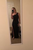 This dress slipped on like a glove! It was beautiful. It is a little long for my shorter stature, but with heels it is fine. The slit is so tasteful but also very flattering. This dress is amazing! - Marley M.