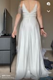 I wanted to love this dress. It was simple, fun, and allowed for movement for dancing. It fit very well, the dress was very long. Nothing a hem couldn't fix. The only problem I had was how see-through the material was. You could see the pockets & the part the zipper was sewn to. - Cassandra K.