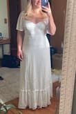 Fits true to size! Super high-quality material and really flowy and pretty. The tie-back adjusts so you can cinch the waist and give the girls a little support! Had to get it shortened but I expected this since any maxi dress usually needs to be shortened an inch or two for my height. - Elissa M.