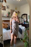 I wore this dress for a night out to celebrate my birthday. The fit was good, but I wore Spanx underneath. If you are a girl who needs a little compression, this dress will not offer any. It is form-fitting. However, for the price, it worked just fine for what I needed. - AnaClare B.