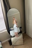 I got this for my bridal shower and absolutely love it! It's stretchy and also formfitting but not too tight. It honestly fits like a glove! My chest is much smaller than my hips so finding dresses that fit well on my whole body is hard. 10/10 would recommend! - Madi K.