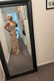 I opened the package and opened the zipper to try on and it broke off right away. And was way too long. But I did love the dress itself!! - Annetta D.