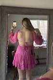 I probably range between an 8-12 (M/L) pant size depending on the brand and this dress fits great.  I ordered a large and it has a zipper in the back but I didn't even have to unzip it to get it on.  The two ties in the back really make the dress sweet.  I'm 5'10-5'11 and it's just long enough that I still feel comfortable.  If you're 6' + I would just take that into account.  Also if you have a large bust, this might not be the dress for you.  I'm probably a large B, small C and the amount of room I have in the dress is just right. The sleeves are a little awkward fitting wise but I don't feel like they're going to fall down. - Alexis C.