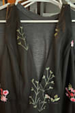 Don't get me wrong. It's a beautiful dress. But the top of the dress has different embroidery than what is currently pictured. And there are multiple areas of frayed strings all around the dress. It fits my middle area but is a little large at the top, so I'll have to bring it in to get it adjusted at the straps area to fit me better. Hope this can be fixed - Sandra Y.