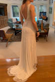 This dress is gorgeous and looks much more expensive than it is. I didn't end up choosing it for my wedding dress because it's fairly heavy with the beads for my outdoor Florida wedding and because I wanted it to be a bit more fitted in the hips. But it was a top contender! - Annika G.