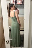 I am 5'9'' and 145 lbs. I am a 32DDD, with 27'' waist and 38'' hips. It is so hard to find dresses that fit me, but this one does! I just need to steam the dress, but it's super cute and comfy. The straps aren't too tight - meaning I can move my arms freely. I would definitely wear a strapless bra, or backless bra with this. I am looking into getting those ''boomba'' bras online for busty women (heard it has good reviews). The material is nice and it does not look cheap. The color is the same as shown online, maybe a little darker. (in the photo it looks very green I know - it's a little lighter in person) - Samantha E.