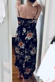 The fabric does have a little sheen to it, which I wasn't sure about before ordering, but I like it. The colors (I got the navy) are gorgeous! I am usually a 6 in dresses, and the medium fits perfectly, especially because the straps are adjustable. Good quality! - Erica T.