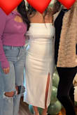 I received so many compliments on this dress, and it was the exact look I was going for. The white wasn't sheer; it's a sturdy but stretchy material. The sleeves around the arm did limit arm movement/range, but I have a larger chest so the support it provided was a tradeoff I was happy to accept. - Cristen L.