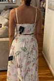I love this set, but the reviews about the skirt being too full are accurate. It's got some weight to it, which is really nice because it's definitely not see-through. I, too, like other reviewers wish you could order the top and bottom separately. I'm small on top and wide on bottom so it makes it tricky. I'm wearing the small here but the top is loose in comparison to the bottom. I also wish Lulus would not outline the cups or use flimsy spaghetti straps. Either a thicker strap so you can wear a bra or no strap would be ideal! Don't know if I'll keep it, but it is a beautiful set and if these issues don't bother you, go for it. Such a fun set to own! - Marline K.