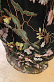 Pros: This dress has stunning embroidery that looks just as good as the photos. The quality seems good so far. The silhouette is great; the high waistline and tulle hide your belly so you could eat a giant meal at your event and no one would be able to tell. No shape-wear required. The cups are decently padded. Cons: It has zero stretch in the bust area so make sure you measure yourself well. I am 2 inches larger than the bust measurement on the size they recommended and I could just barely fit into it. NOT for anyone with breasts larger than an A-cup, maybe a small B-cup, because the cups are TINY. Not sure if this is just a problem with the dress I got, but the clasp at the back is almost impossible to close; the zipper keeps it apart when zipped up. They should end the zipper 1-2 cm away from the clasp to fix this. - Grace Y.