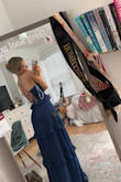 I bought this dress for my senior pics along with another dress. However, in the other dress, I ordered an xs, and it fit. It was very snug when zipping, but this dress was ordered in a small and fits perfectly! - Sydney S.