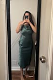 This is a lovely dress! I love the silk, rose pattern. In my opinion, it's a bit long for a midi dress and the side boob area is a bit loose. - Areli C.