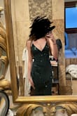 The dress came and was in perfect condition. It fit me really well and the straps were pretty adjustable to fit my shoulders/chest the right way! As shown in the site picture, it runs pretty long, and it came just like that, so know that you may have to get it altered before wearing it if the length bothers you. It's a beautiful dress and it was highly complimented! - Ella G.
