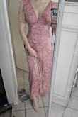 Dress is exactly as pictured. Very pretty. Ended up returning because it wasn't quite as formal as I needed. - Kristine J.