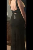 Very good quality. Thick material. Very flattering. Covers back rolls. - Meadow M.