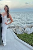 I wore this for my rehearsal and rehearsal dinner. It had to be hemmed but other than that, it was perfect! - Jaclyn S.