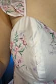 The quality is beyond horrible. The material is cheap and the cups are the biggest issue. They are weirdly shaped, uneven, and see-through. The dress material itself feels like a child's dress-up dress. It is also longer than it appears in the photos and almost touches the ground and I am by no means short. Do not purchase this. This is worse than SHEIN quality for a much higher price. I'm not sure a skilled seamstress could salvage this. - HANNA F.