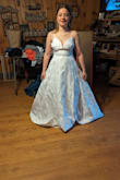 I had been searching for a simple but not plain dress for my wedding, and I fell in love with this fabric! It is so soft and shimmery; I'm deeply in love. Did not love the straps that came with the dress as they were ribbonlike. Luckily, I had plenty of fabric to take from the bottom and make new ones. I purchased a size small because I have a small chest, but there was still some gapping. Easy fix! - Jade F.